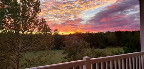 Sunset from back deck looking onto 9th fairway of Normann Course,.