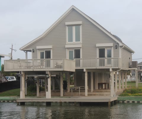 Canal house - ideal for fishing downstairs on the dock and enjoying the breeze.