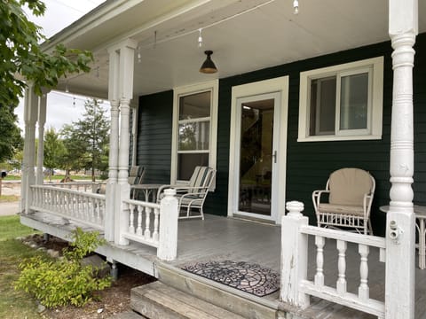 Entrance to 2nd Floor on the northwest corner of the house. Porch faces East Bay