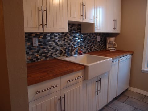 Kitchen with dishwasher and all new appliances.
