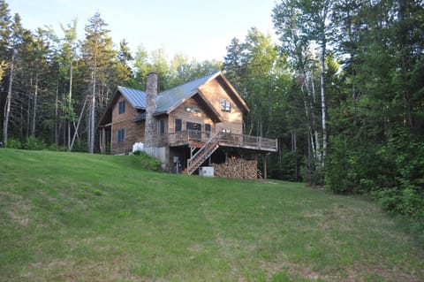 The back of the home from a distance.  A very quiet and serene property