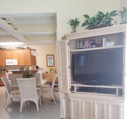 corner 50" flat tv in LR, with ocean views from windows