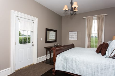 Downstairs bedroom with King size bed.