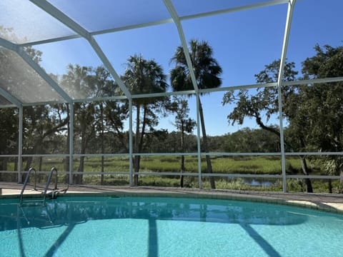 Pool View of Parklands adjacent to our 3.8 acres - Great area to kayak!