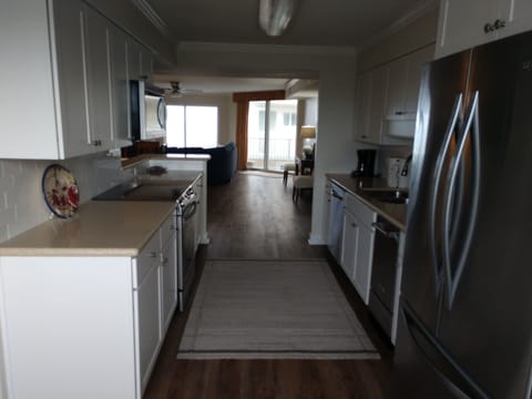Kitchen looking into main living area & the Gulf 🏖️