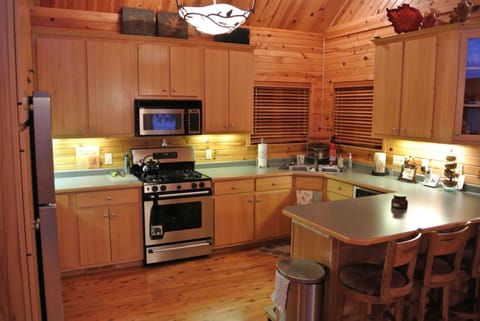 kitchen open to great room and dining area