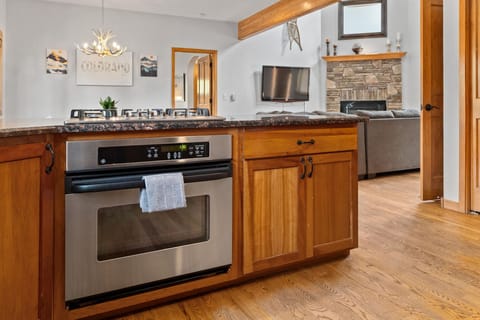 View from the kitchen area into living and dining areas