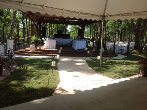 Patio with tent looking toward the pavilion