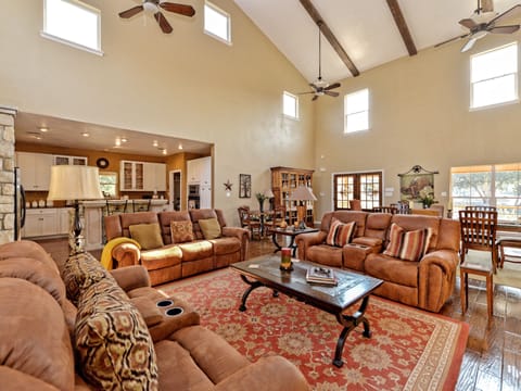 Another  view of living room, looking towards kitchen and dining area.  