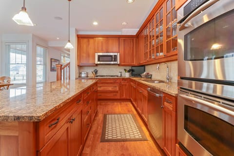 Plenty of space for several helpers preparing a meal for a large family.