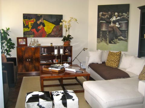 living room with tv, stereo and dvd, that over looks the city