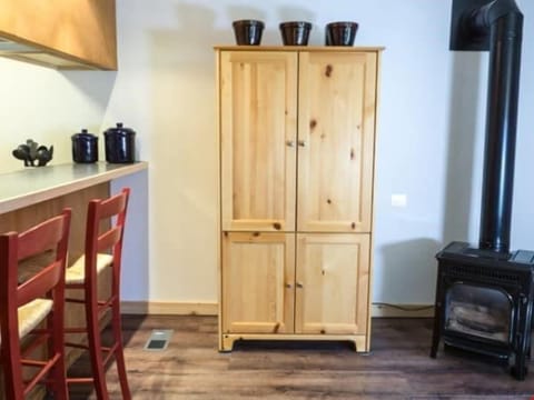 Warm up by the fireplace or entertain at the dining table.