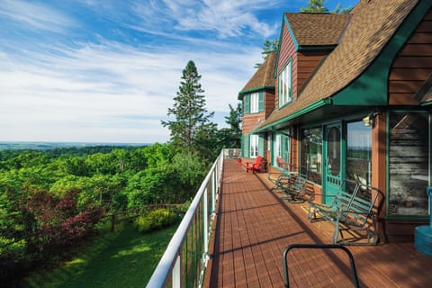 Back Deck Runs Along Full Length of House; Seating for 20; 2 Patio Tables; View