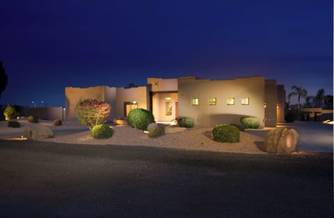 Front of Estate Home with 3 car garage on the right