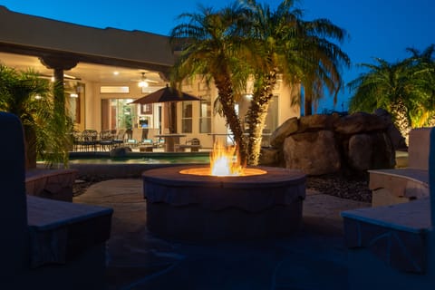 Feel the warmth sitting around the wood burning fire-pit