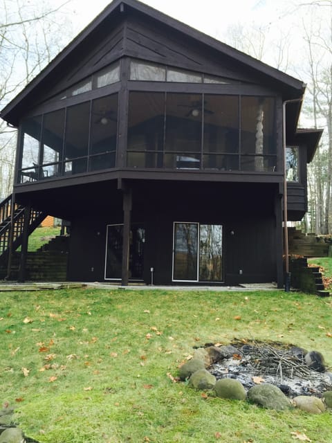Enjoy watching lake activity while sitting out on the  screened porch