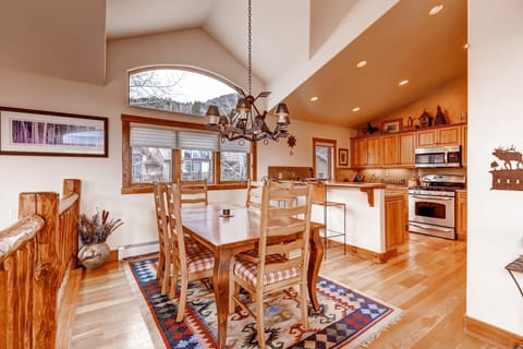 Share meals and laughs at the grand dining table.