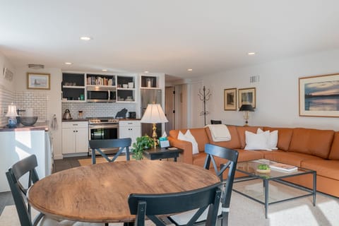 Great Room with large sectional and dining table for 4