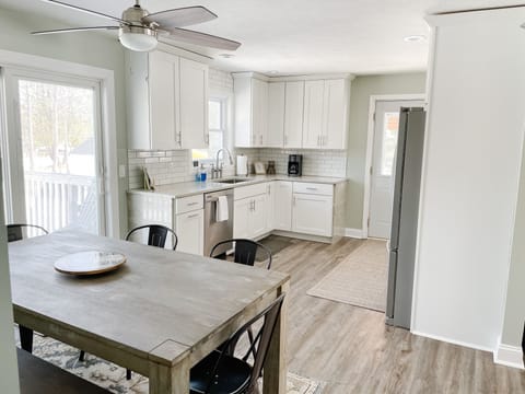 Kitchen with full dining table - 4 chairs and one dining bench