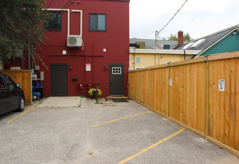 Back parking lot with on-site parking for all guests.