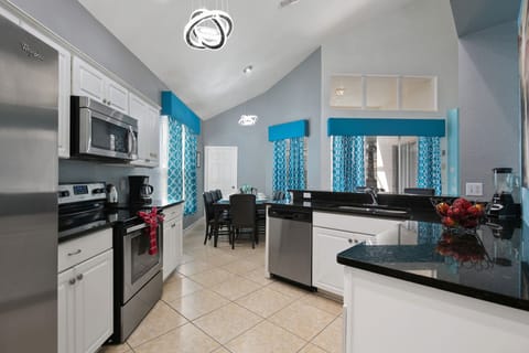 Fully stocked kitchen with stainless steel appliances and granite counter tops!