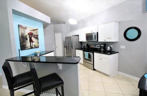 Fully stocked Kitchen with Stainless Steel Appliances