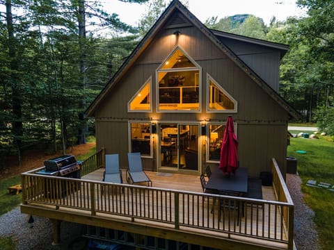 Weber grill,  outdoor patio set and chaise lounges for morning coffee.
