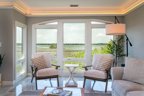 Welcome to 2105 Bay Point.  Stunning second floor unit with beautiful marsh views!