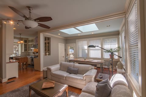 Family room with large screen TV and plenty of seating