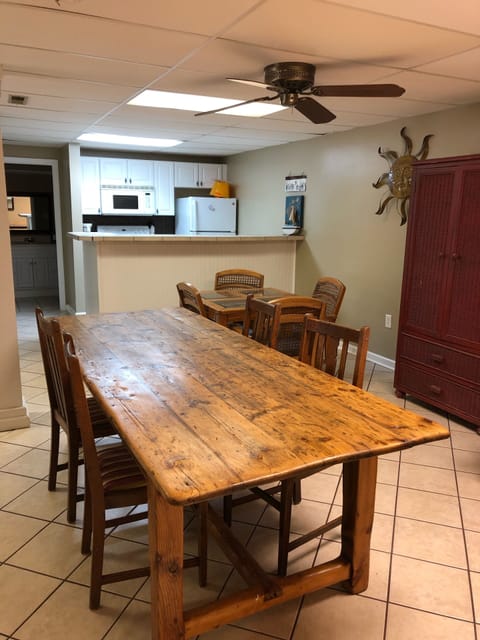 Lower level table with ping pong removable top. Small full kitchen down. 