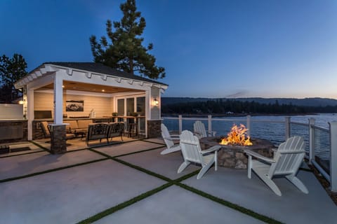 Heated gazebo with firepit and Lion BBQ, warming drawer, outdoor refrigerator