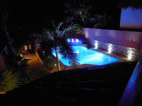 Night view of pool from Master bedroom balcony