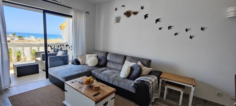 Living room with terrace and ocean view