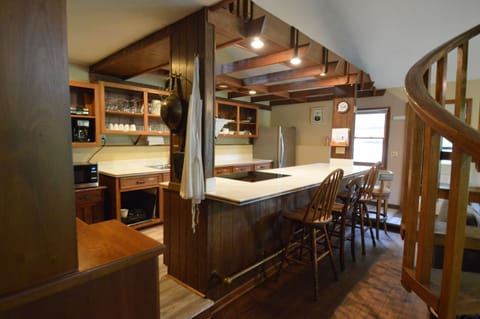 Kitchen with bar seating for 4 currently.