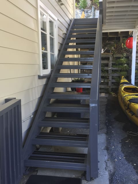 Wooden stairs for access to the apartment