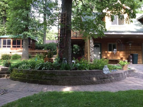 Gazebo with hot tub and guest house & game room.