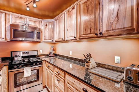 Slab Granite Tops & Soft Close-Hickory Cabinets