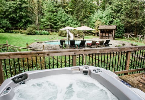 Looking at pool from hot tub on deck