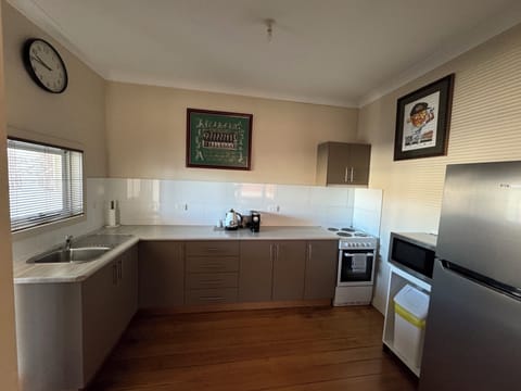 Kitchen. Open plan to dining room.