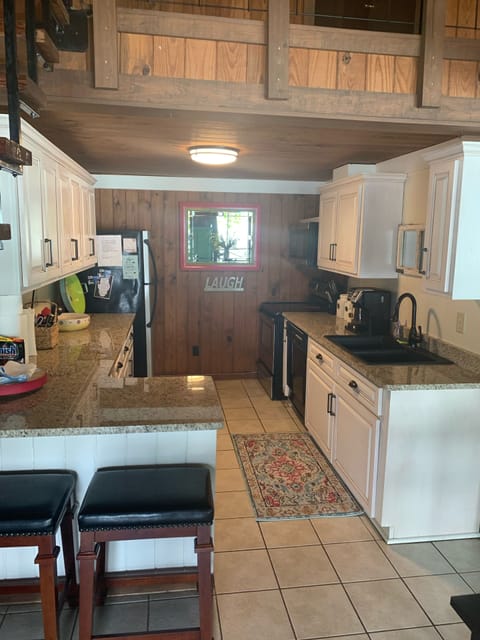 Kitchen with microwave/ stove,dishwasher,refrigerator/ice maker,coffee maker
