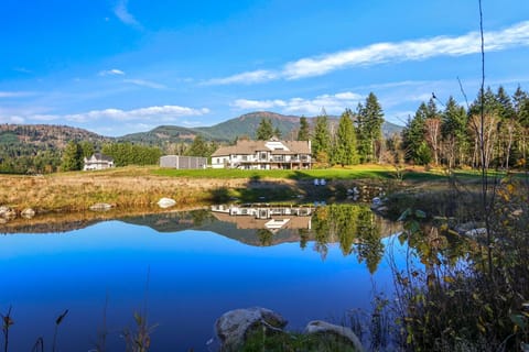 Lodge and acreage as seen from the far side of the Pond.
