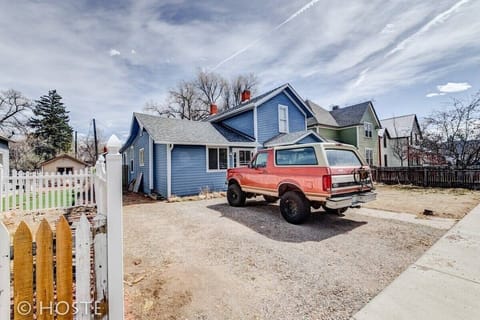 Pull right into the driveway and settle into this charming blue home before heading out to explore the neighborhood.