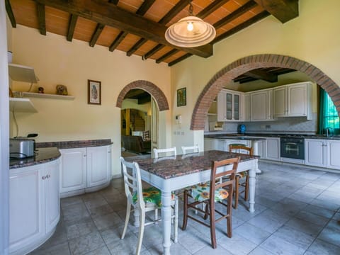 Table, Furniture, Cabinetry, Countertop, Wood, Kitchen, Kitchen Appliance, Interior Design, Chair, Floor