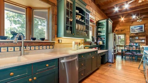 This rustic kitchen embraces the lakeside cabin aesthetic.