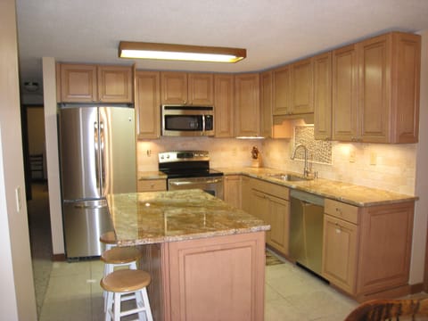 Stainless Steel Appliances and Granite Countertops.