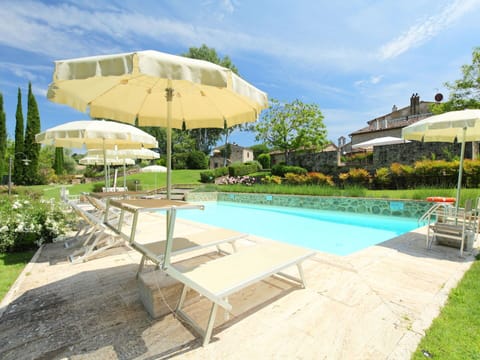 Sky, Cloud, Plant, Water, Swimming Pool, Umbrella, Shade, Tree, Outdoor Furniture, Building