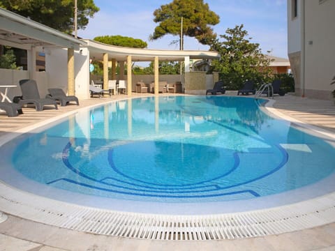 Water, Property, Sky, Swimming Pool, Azure, Body Of Water, Leisure, Building, Composite Material