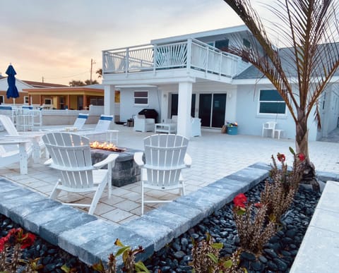 View of NE corner of property. Notice Large fire-pit with plenty of seating