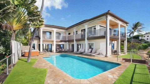 Stunning beachfront property featuring modern tropical architecture with wraparound terraces, a private pool surrounded by palm trees, and direct views of turquoise waters under bright Caribbean skies.