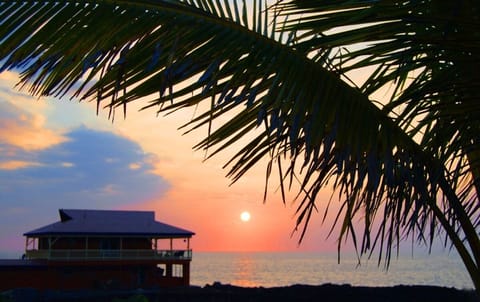 Hale Kai Sunset and your Tropical Dream Home 20 feet from the Sea!